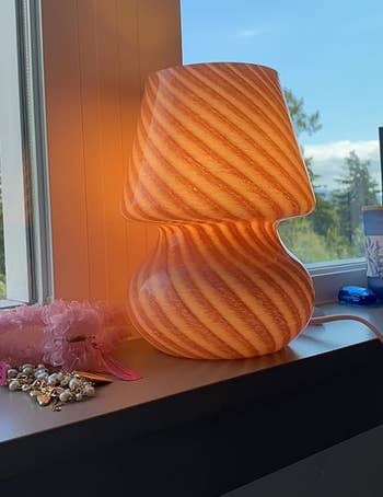 mushroom lamp with pink and white striped pattern 