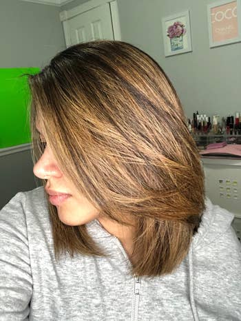 reviewer with healthy and shiny straight hair