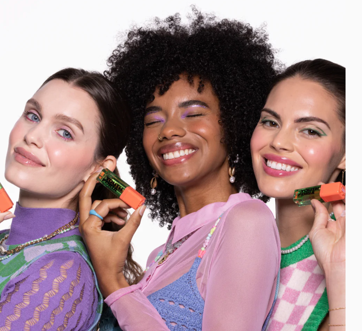 three model wearing the blush oil
