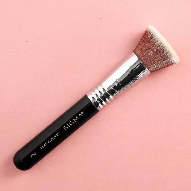 the brush on a pink background