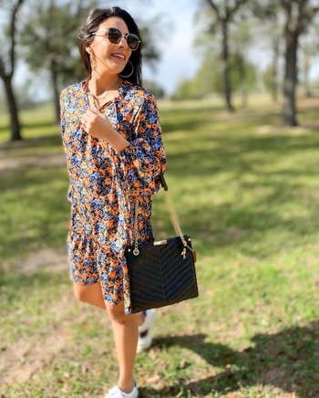 reviewer photo wearing the floral minidress outside