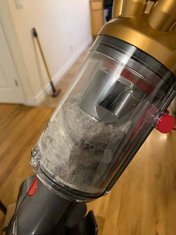 Dyson vacuum dust bin with dirt inside