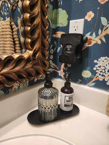 reviewer image of the tray with soap dispensers on it