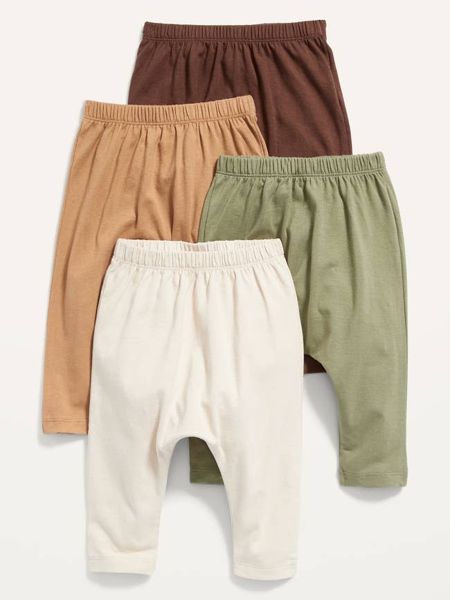 the four pack of pants in cream green brown and tan