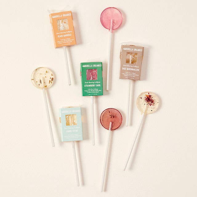 circular lollipops with flower bits inside 