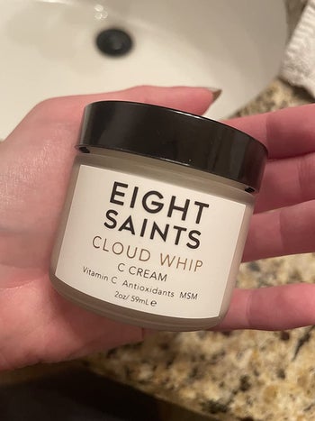 reviewer photo holding the Eight Saints Cloud Whip C Cream