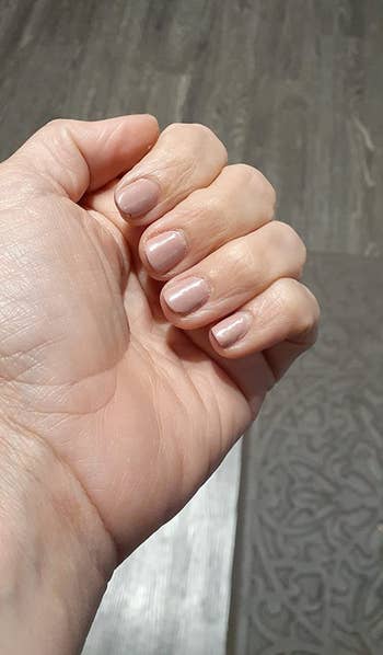 image of reviewer's dry, painted nails