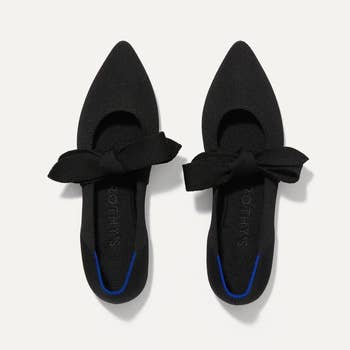 pointed toe flats with tie bow decoration across top of foot