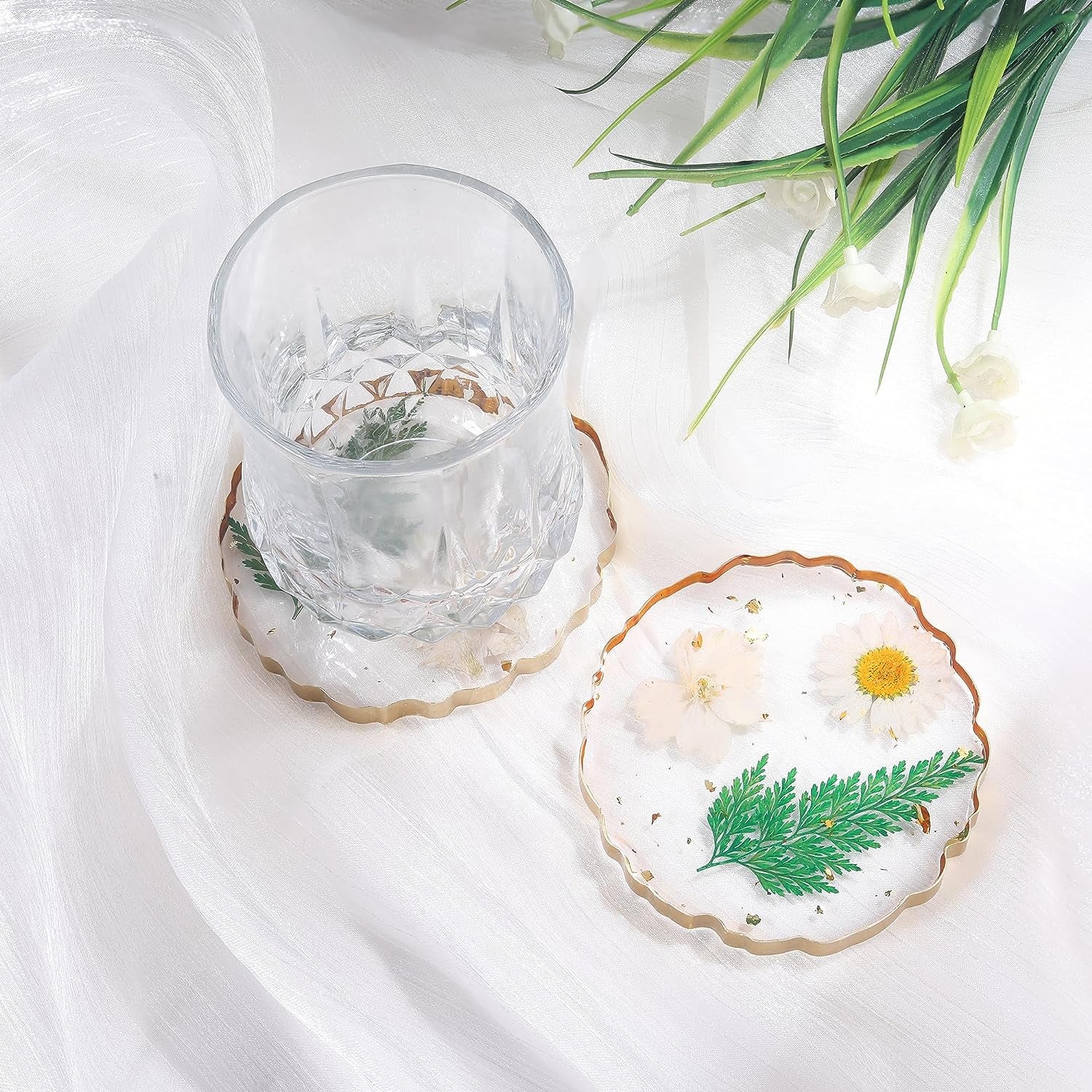 a coaster with pressed flowers inside
