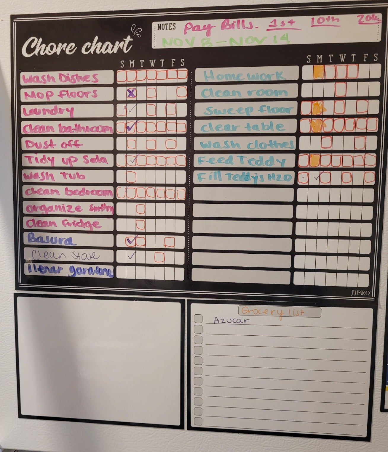 a reviewer photo of the chore chart mini dry erase board and mini dry erase to do list 