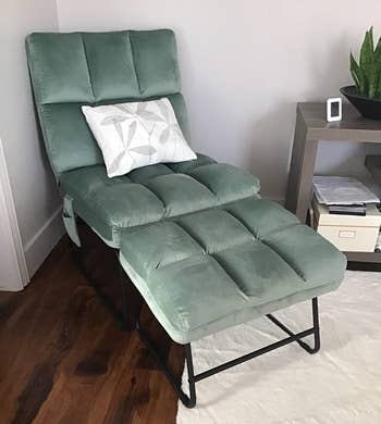 Reviewer image of product in light green with a small handing side pocket and a white and gray throw pillow