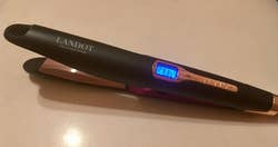 Reviewer image of black and pink straightener with digital display