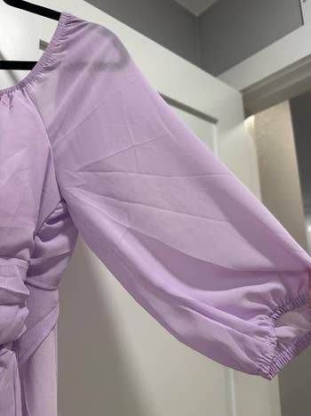 A wrinkled purple blouse