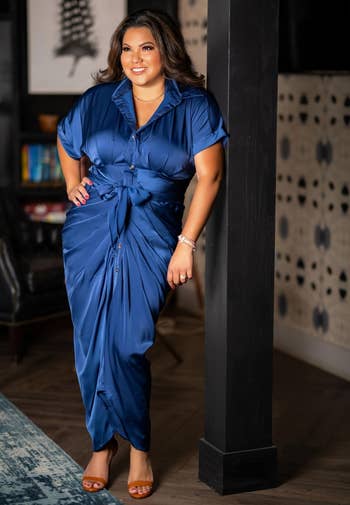 reviewer wearing the formal  successful  blue