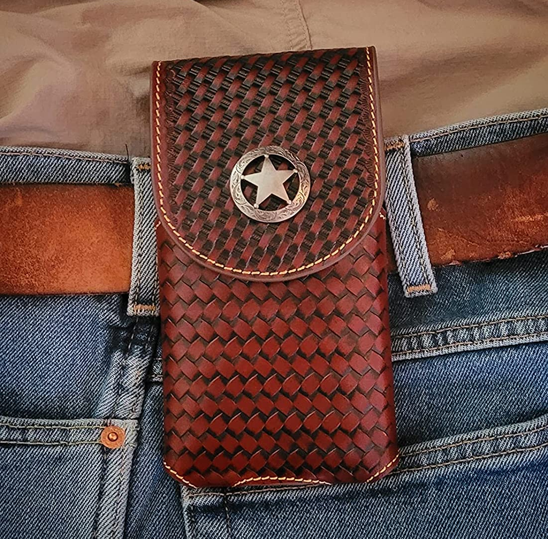 Reviewer wearing slim woven brown leather phone holster attached to brown belt with gold star embellishment 