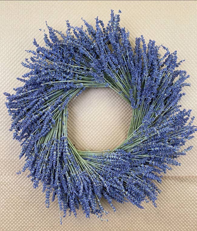 Lavender wreath sitting against a brown background