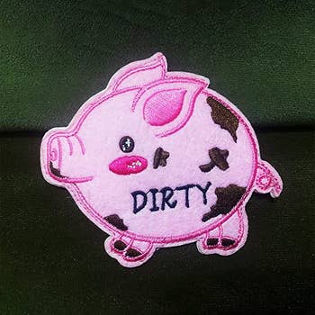 other side with muddy pig and word 