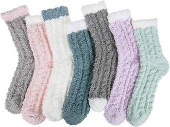 seven different colored fluffy socks