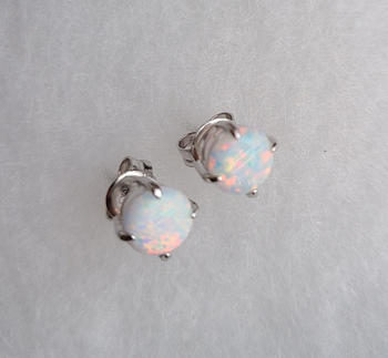 Reviewer image of the opal stud earrings