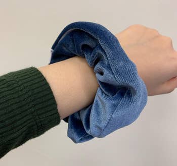 the scrunchie on reviewer's wrist