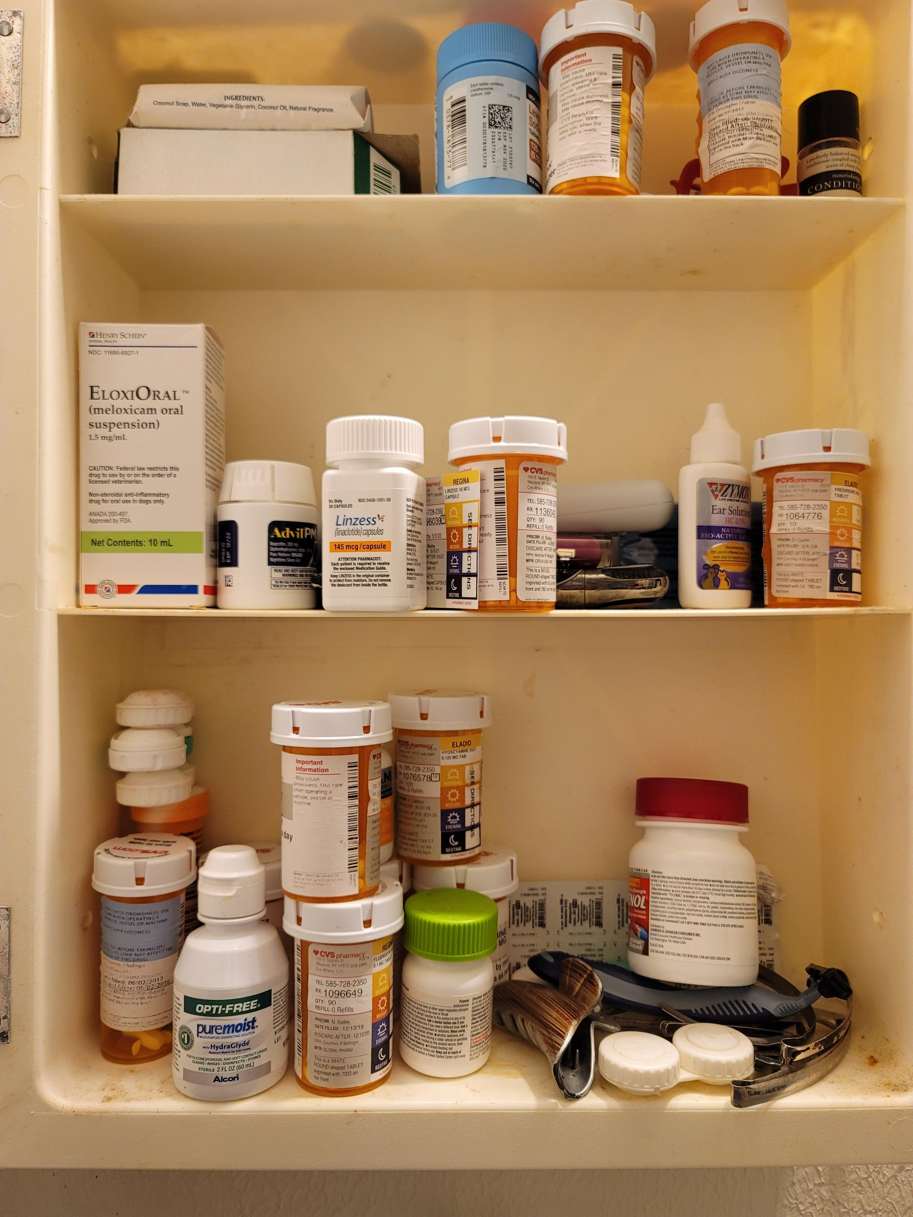 A cabinet filled with various medication bottles and personal care products, suggesting a focus on health and wellness in shopping