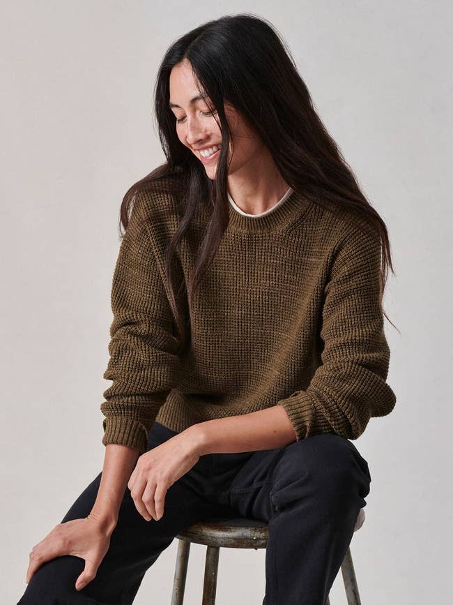 model wearing brown cropped sweater