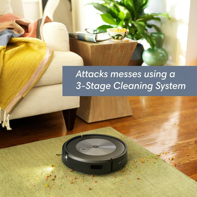 the robovac cleaning crumbs on hardwood floor onto a carpet with text on image that says 