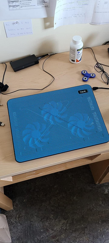 reviewer photo of the cooling pad in blue