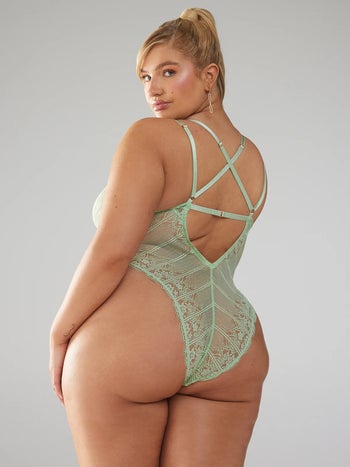 model showing off strappy back of the teddy