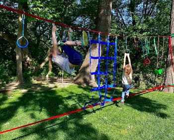 two kids connected the ropes course