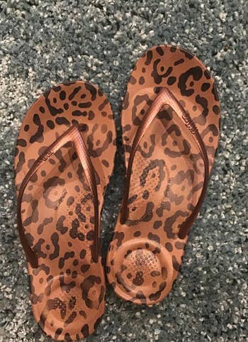 Leopard print flip-flops