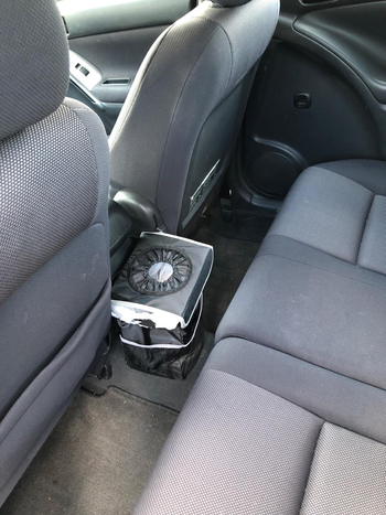 the trash can between seats in another reviewer's car