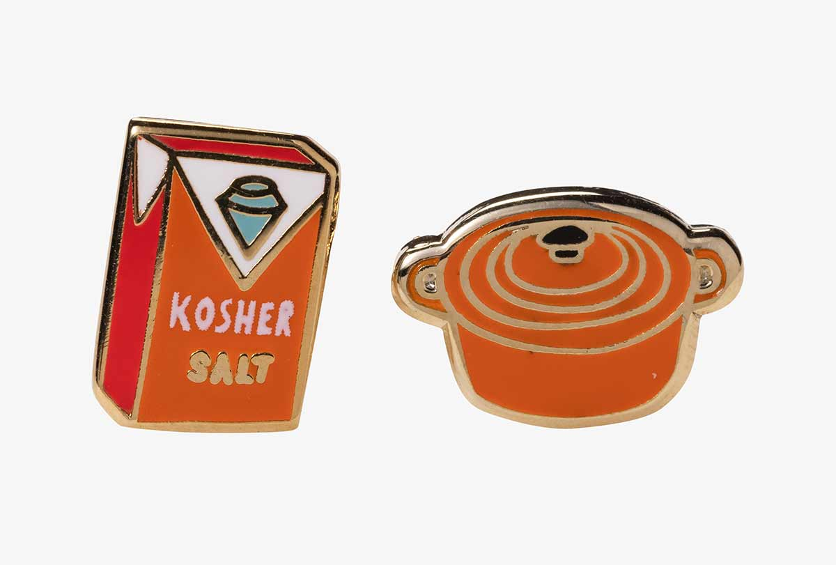 red earrings one shaped like salt box and the other a dutch oven