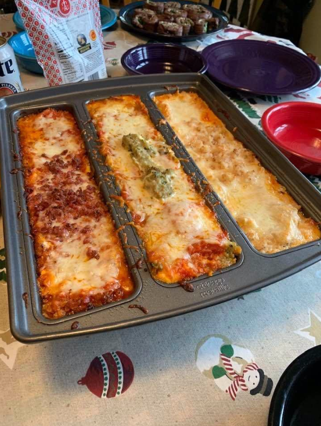 reviewer pic of pan with three channels of different kinds of lasagna