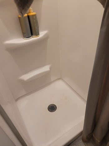 reviewer's shower stall now completely clean and white