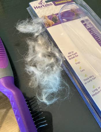 A customer review photo of all their dog's hair removed with the brush