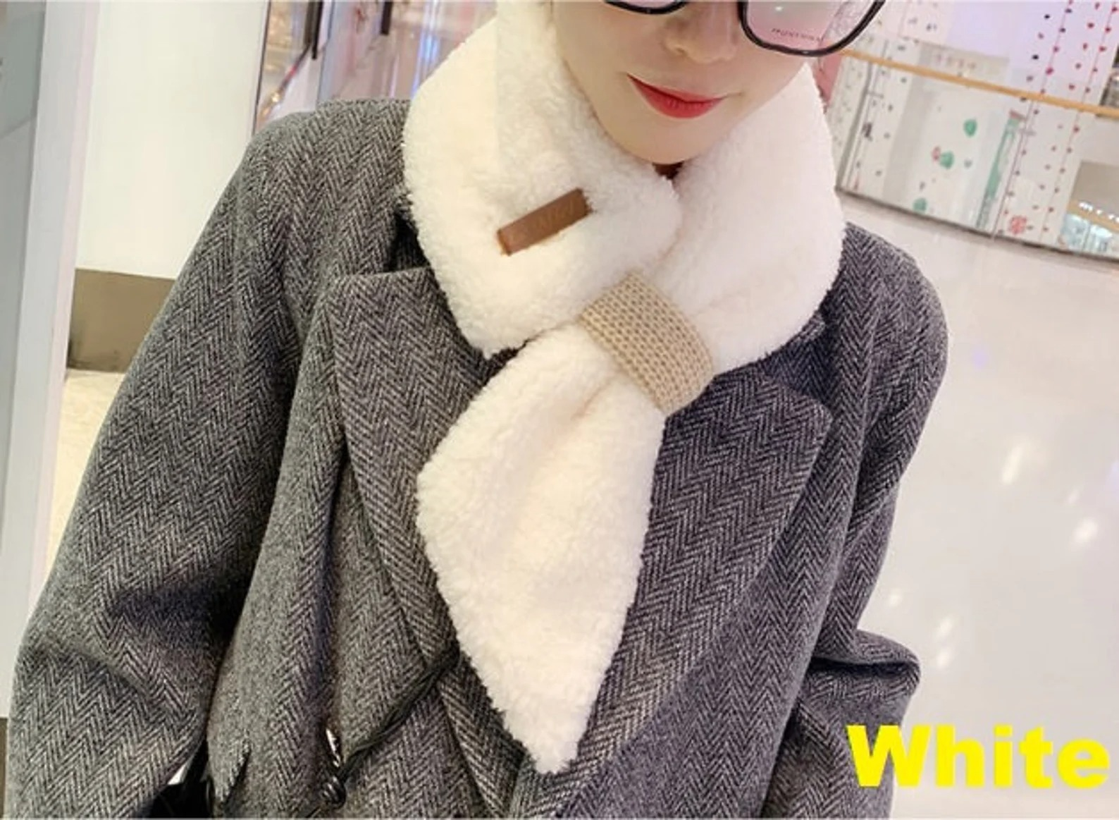 model wearing white scarf