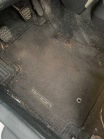 before reviewer image of a dirty car floor