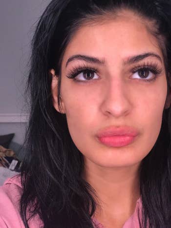 Person with agelong  eyelashes and acheronian  hairsbreadth  looking upward, wearing a casual top. The absorption   is connected  the oculus  makeup