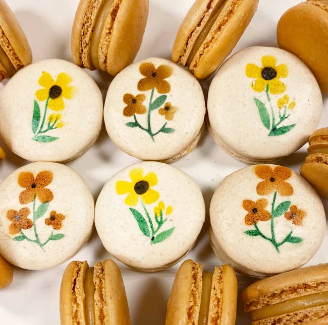assortment of macarons with flowers printed on them