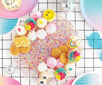 Sprinkle tray with cupcakes and disco ball decor 