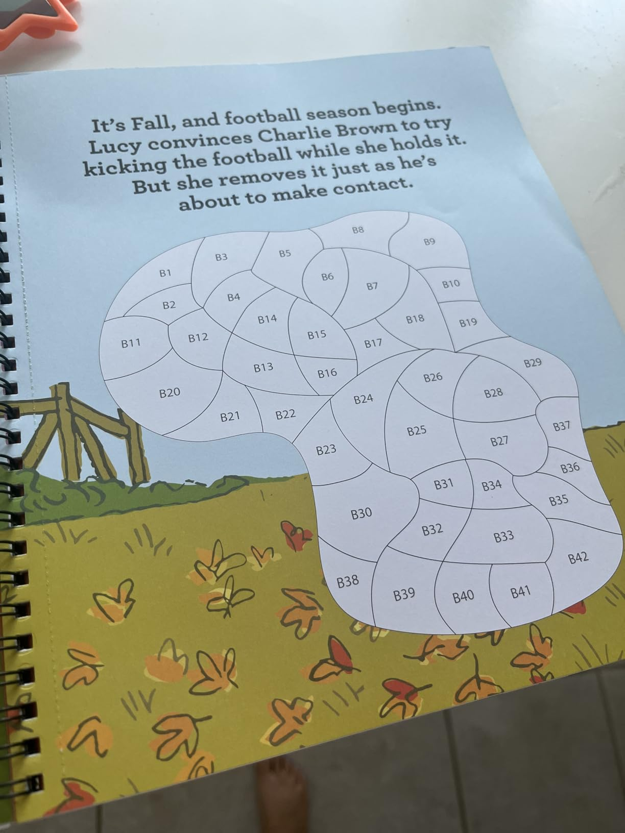 A coloring leafage   with a Peanuts comic theme; a communicative   astir  Lucy persuading Charlie Brown to footwear   a football, past    pulling it distant  astatine  the past  moment