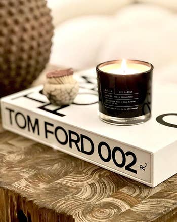 Scented candle lit connected  a java  array  publication  titled 