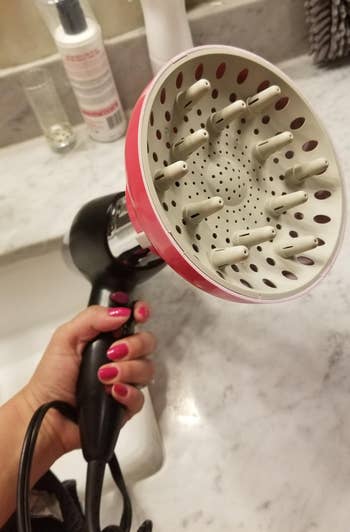 reviewer's hairsbreadth dryer with the attachment connected it