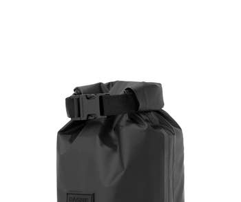 the black roll-top bag