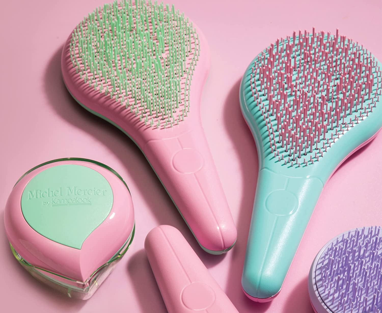 assortment of detangling brushes