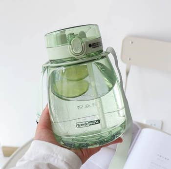 a pretty green clear water jug