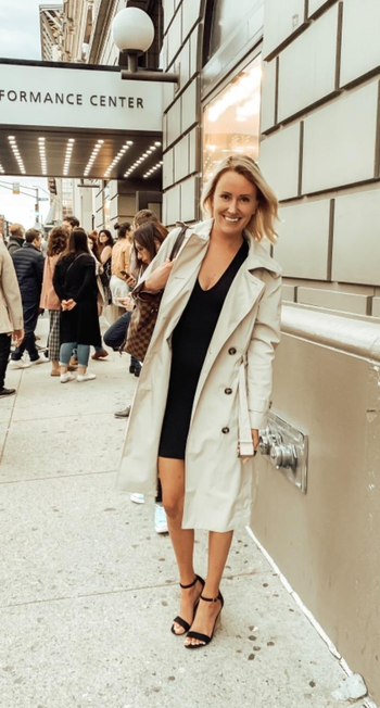 reviewer wearing the trench in beige