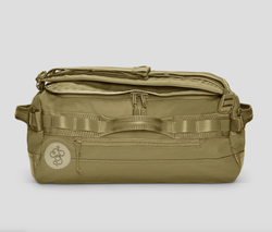 The mini to-go bag sitting on its back in color crocodile 