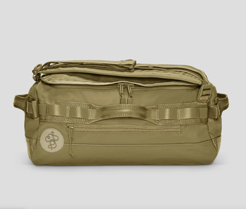 The mini to-go bag sitting on its back in color crocodile 